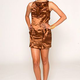 Illustration for article titled emProject Runway/em: Team Ugly Brown Dress Vs. Leatherface
